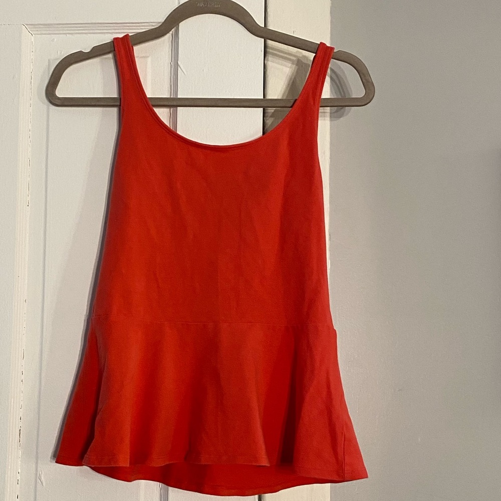 Melon peplum tank top